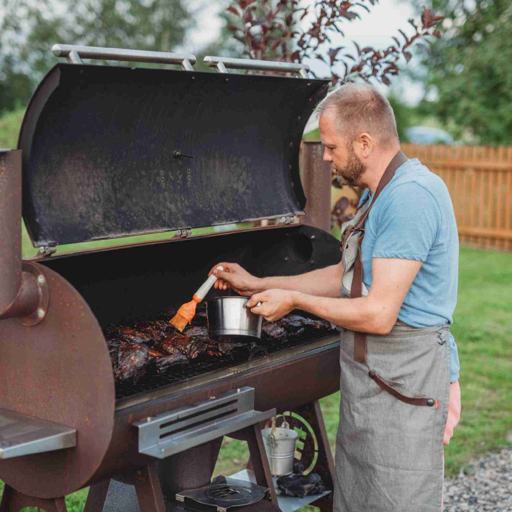 Basting Food in the Smoky Beast XL